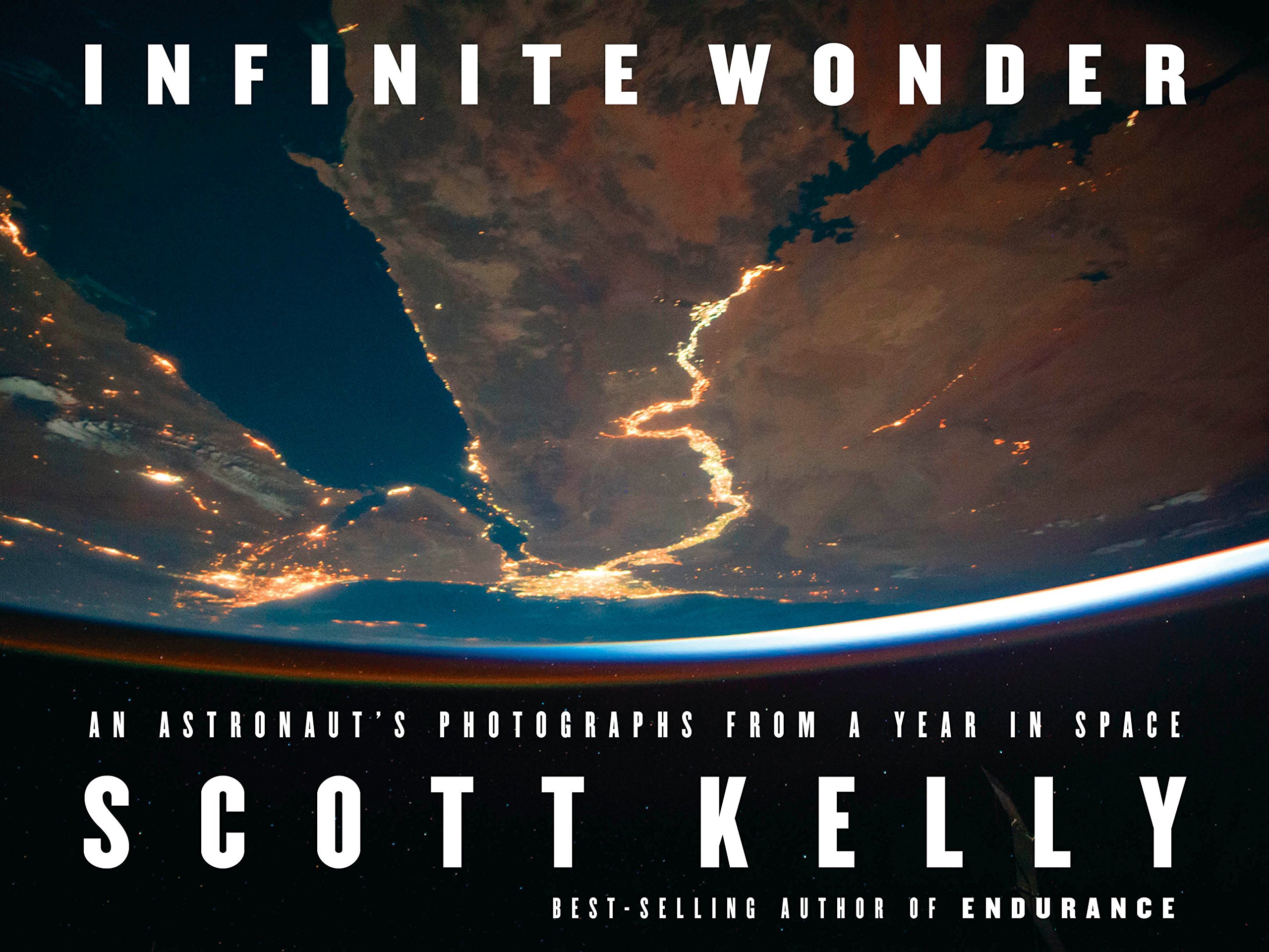 Book Cover Infinite Wonder: An Astronaut's Photographs from a Year in Space