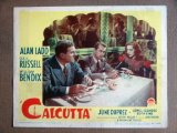 DZ02 Calcutta ALAN LADD/GAIL RUSSELL 1946 Lobby Card.  Here's a terrific lobby card from the original release of CALCUTTA featuring a great image of ALAN LADD , GAIL RUSSELL and WILLIAM BENDIX.    Lobby card is in VERYGOOD+ condition. No pinholes, no stai