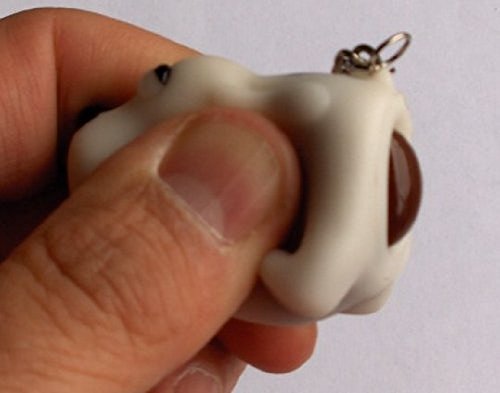 Naughty Pooing Dog Keychain by Novelties Wholesale