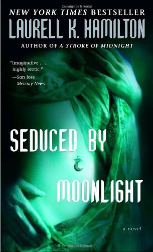 By Laurell K. Hamilton:Seduced by Moonlight (Meredith Gentry, Book 3) [Mass Paperback]