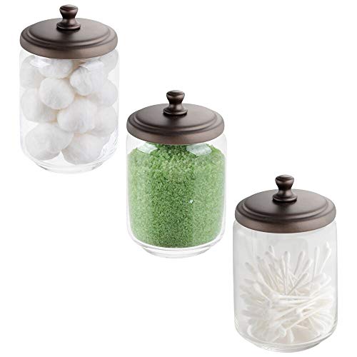 Book Cover mDesign Modern Glass Bathroom Vanity Countertop Storage Organizer Canister Apothecary Jar for Cotton Swabs, Rounds, Balls, Makeup Sponges, Blender, Bath Salts - 3 Pack - Clear/Bronze