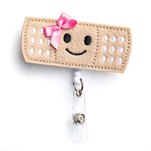 Nurseology Nurse Badge Reel Retractable – Nursing Name Badge Holder – Felt Badge Reel for Nurses, Students & Teachers – Cute Badge Reels for Nurses – Alligator Clip (Girl Bandaid)